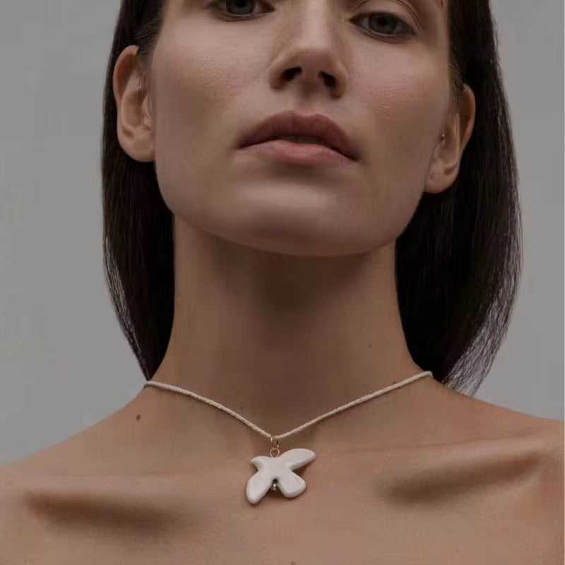 White Dove Ceramic Choker on White Cord