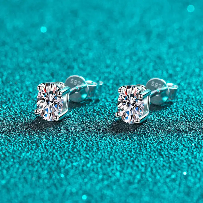 Oval Moissanite Stud Earrings 2 CTW Each | D Color, VVS Clarity, Platinum-Plated Sterling Silver