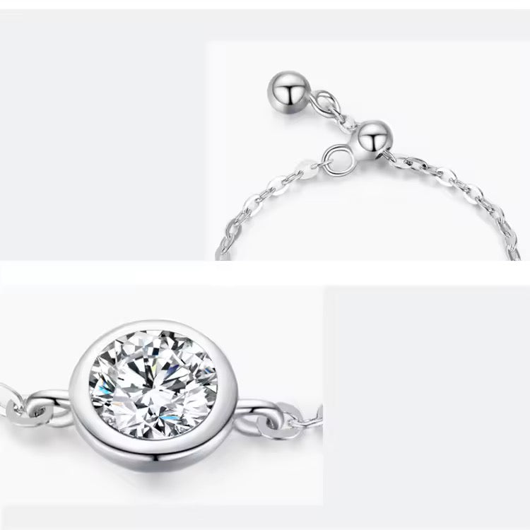 Adjustable silver ring with a radiant zircon centerpiece