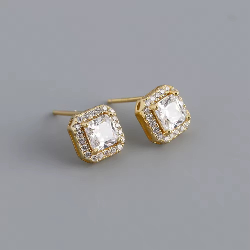 Silver earrings with white zircon stones finished with 18k gold plating