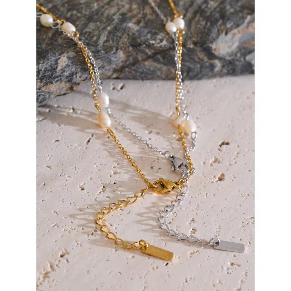 Premium stainless steel necklace with freshwater pearls finished with 18k gold plating