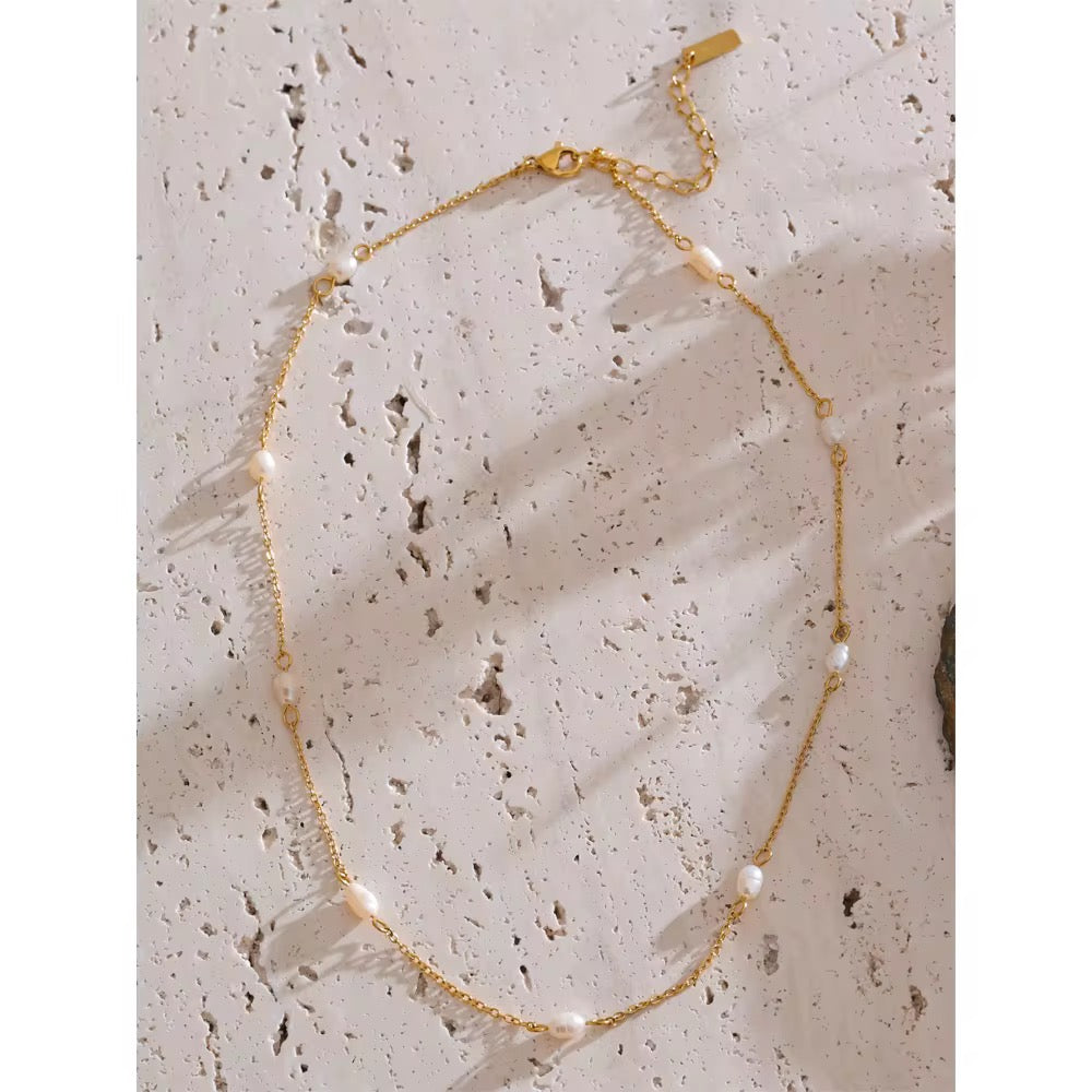 Premium stainless steel necklace with freshwater pearls finished with 18k gold plating