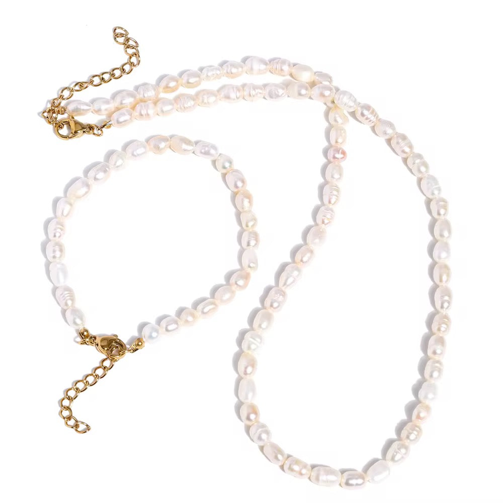 Premium stainless steel necklace with  freshwater pearls finished with 18k gold plating