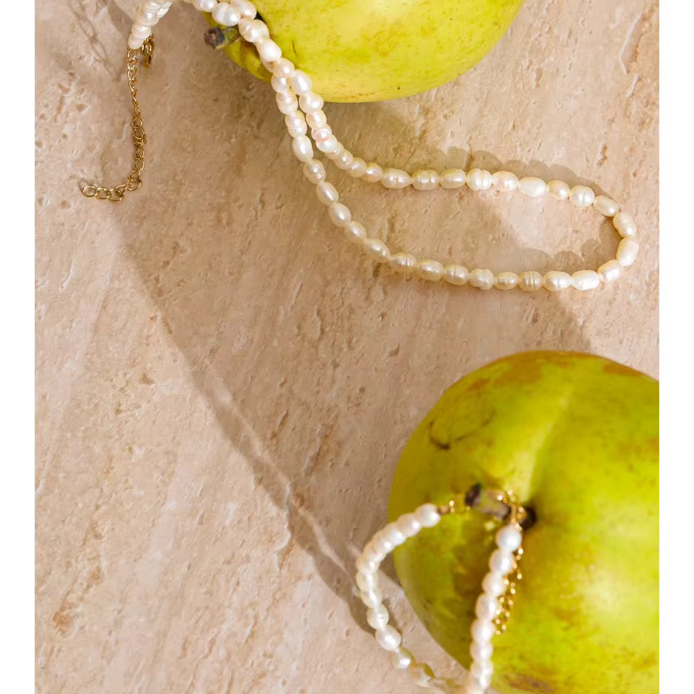 Premium stainless steel bracelet with freshwater pearls finished with 18k gold plating