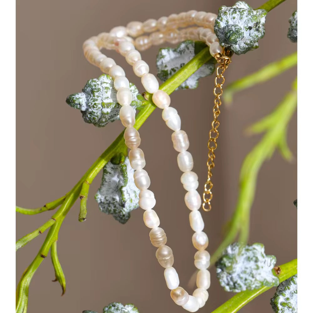 Premium stainless steel necklace with  freshwater pearls finished with 18k gold plating